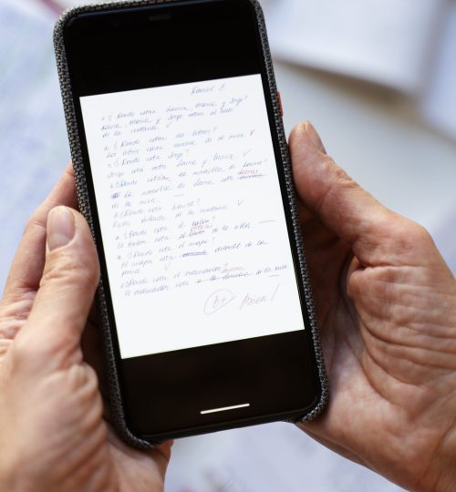 top-view-hands-holding-smartphone