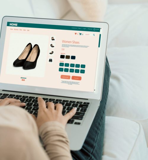 Woman shopping online on internet marketplace browsing for crucial sale items