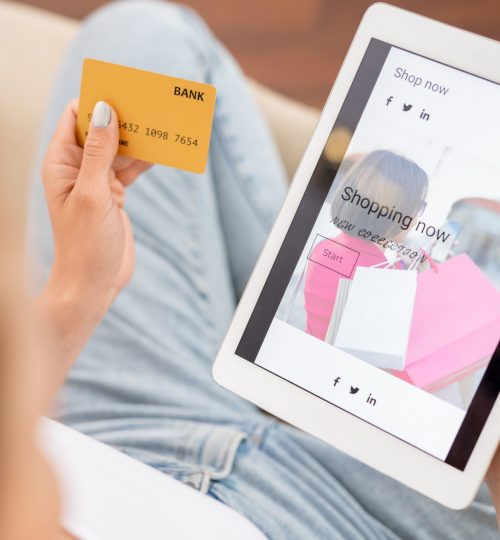 Young shopaholic going to look through new casualwear collection in online shop